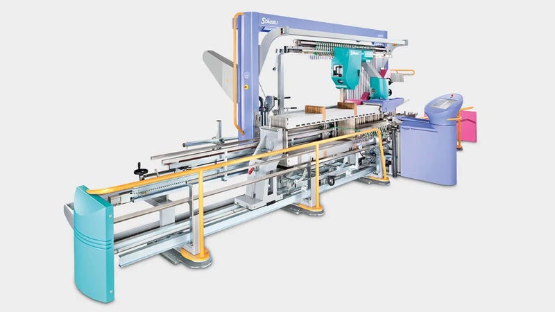 Automatic drawing-in machine