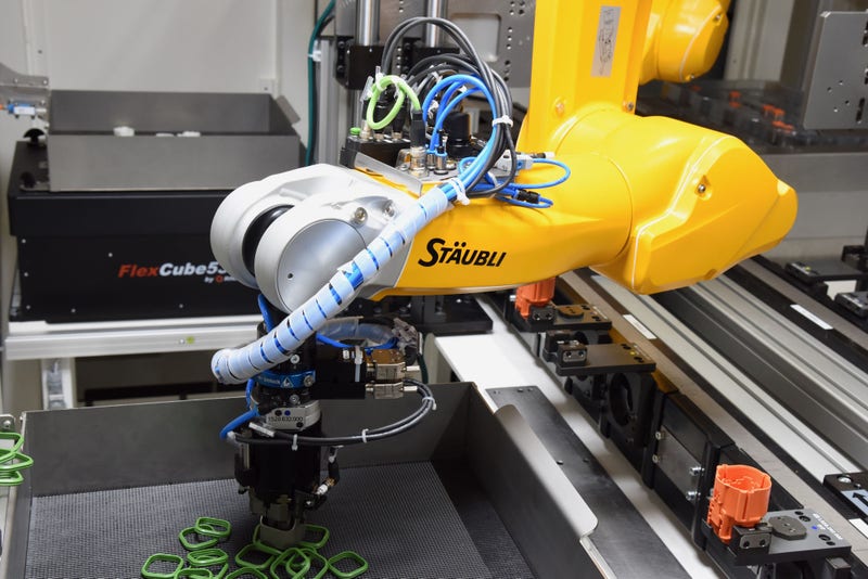 Robot-assisted assembly of high-voltage connectors for electric vehicles